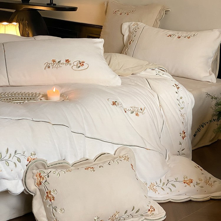 High-quality embroidered bedding set made of cotton percale with ruffled hem and floral relief