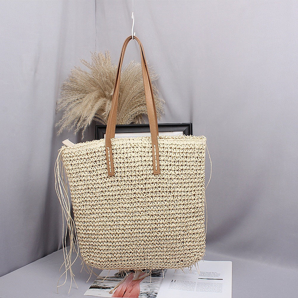 Siopsrl | Handwoven beach bag made of natural materials with leather accents Siopsrl