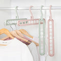 Foldable Multi-Slot Space-Saving Cascading Closet Hanger With Swivel Hook