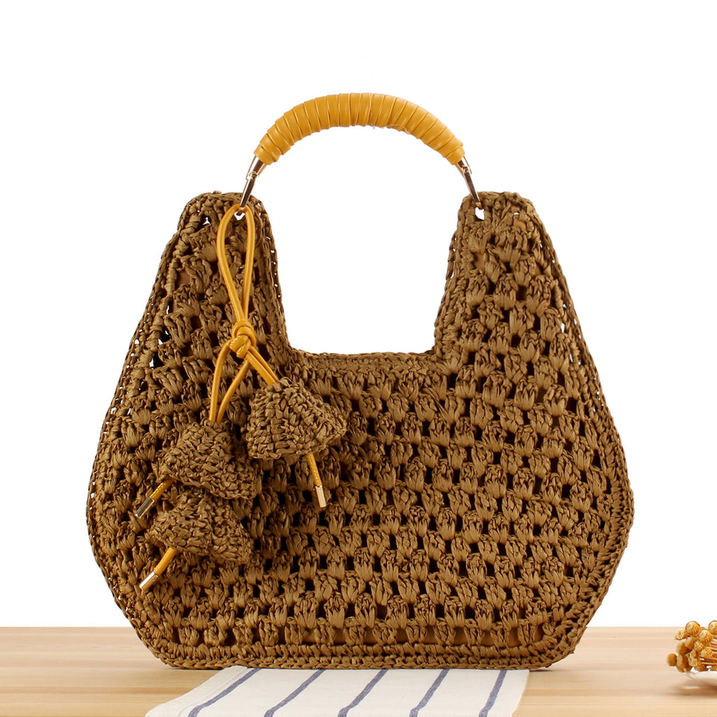 Siopsrl | Handbag Made from Handcrafted Natural Material with Unique Tassel Pendant Siopsrl