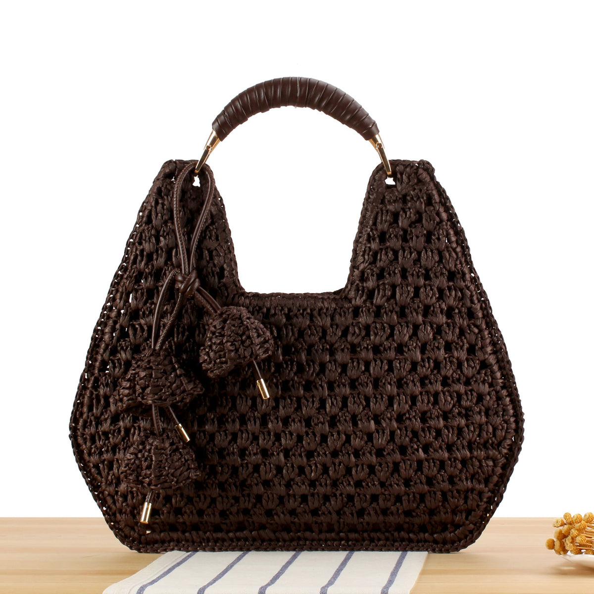 Siopsrl | Handbag Made from Handcrafted Natural Material with Unique Tassel Pendant Siopsrl