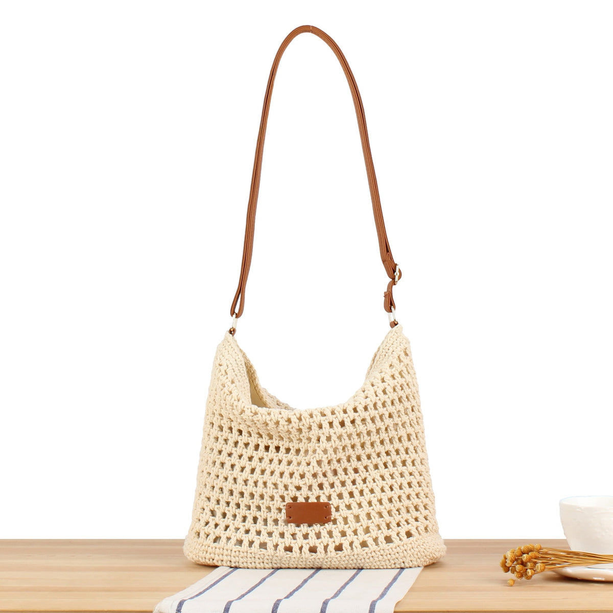 Siopsrl | Handbag made of hand-knotted natural material with leather accents Siopsrl