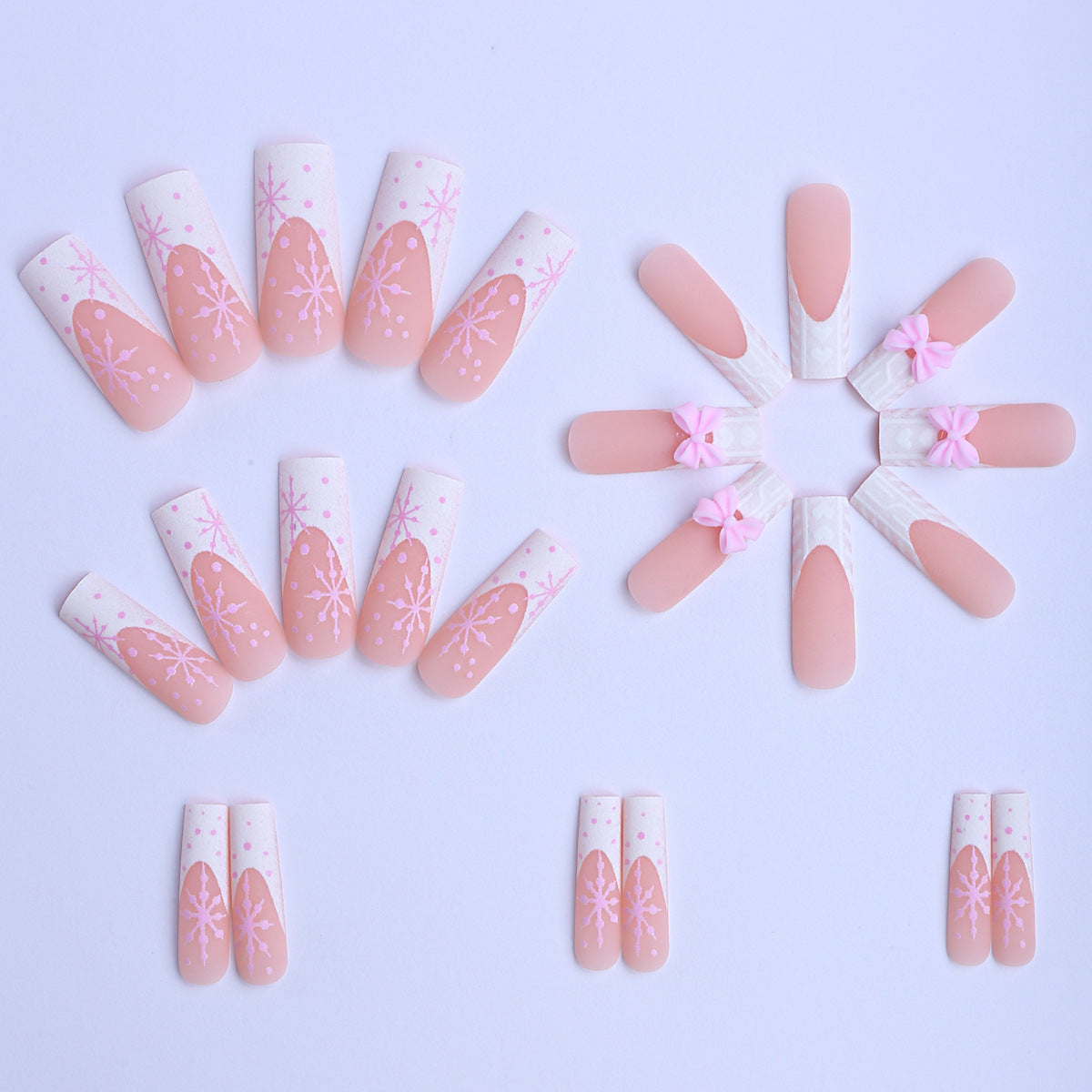Siopsrl | Artificial nail tips with playful bows and snowflake design Siopsrl