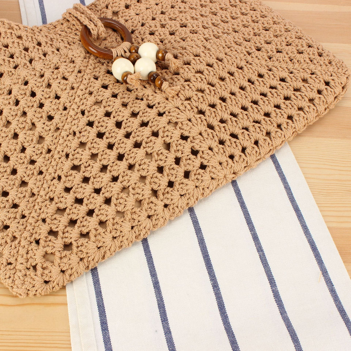 Siopsrl | Handbag made of hand-knotted natural material with chic tassel decoration Siopsrl