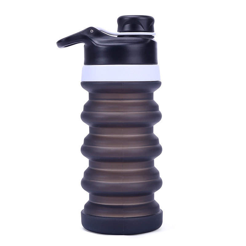 Siopsrl | Collapsible silicone water bottle with ergonomic ribbed grip and flip-top spout Siopsrl