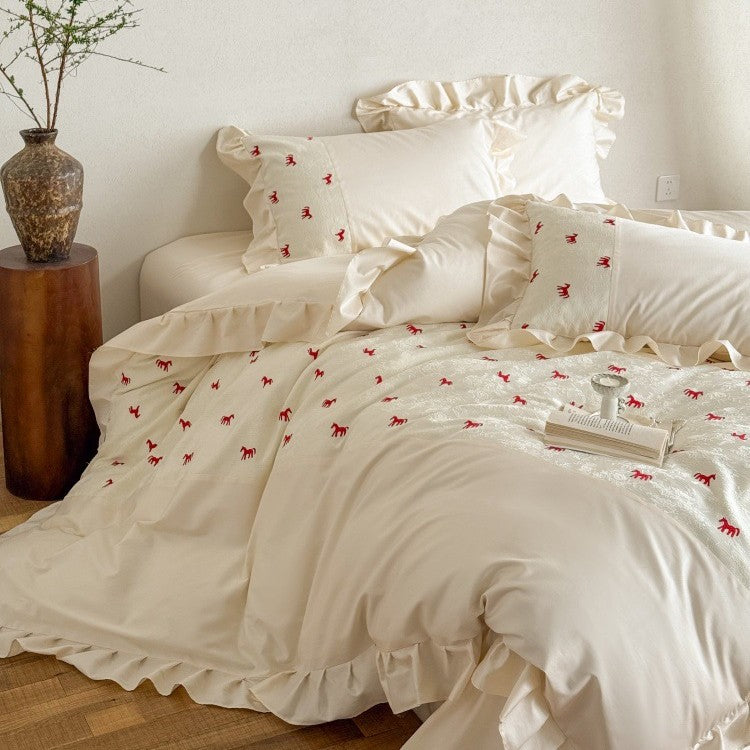 Romantic cotton satin bed linen set with ruffle, decorative panel and delicate animal print Bowlift
