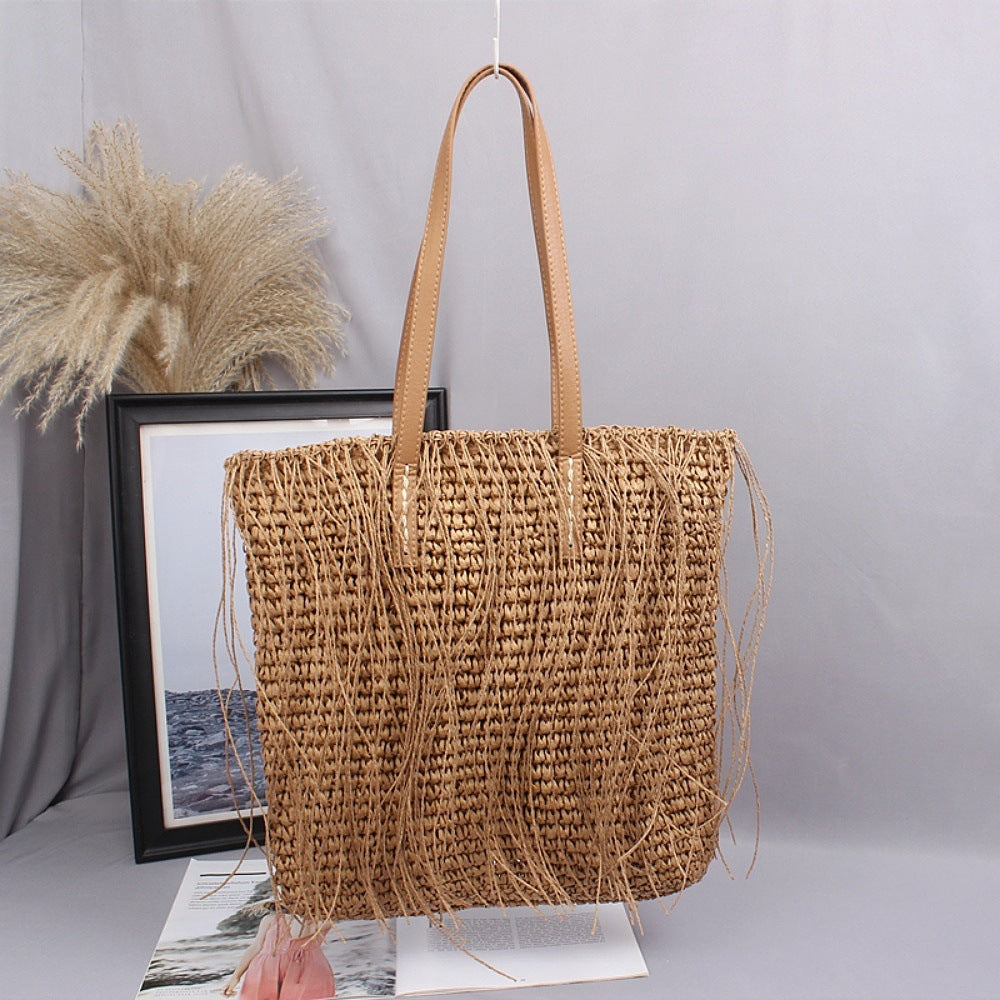 Siopsrl | Handwoven beach bag made of natural materials with leather accents Siopsrl