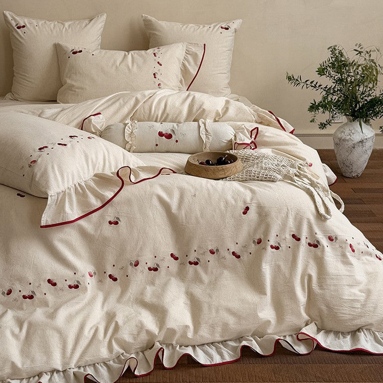 Bedding set with delicate cherry embroidery, ruffle and linen look