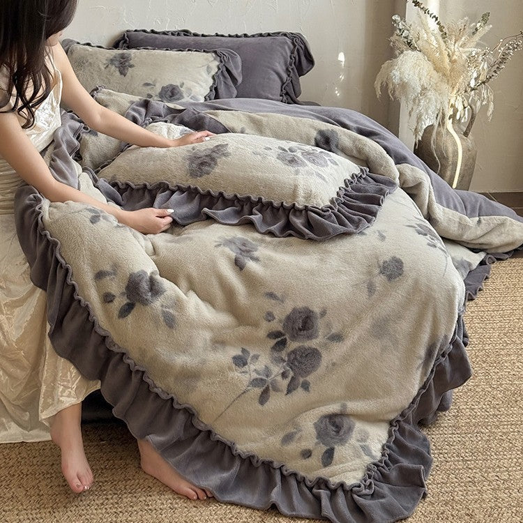 Microfleece bedding set with floral velour relief and decorative trim