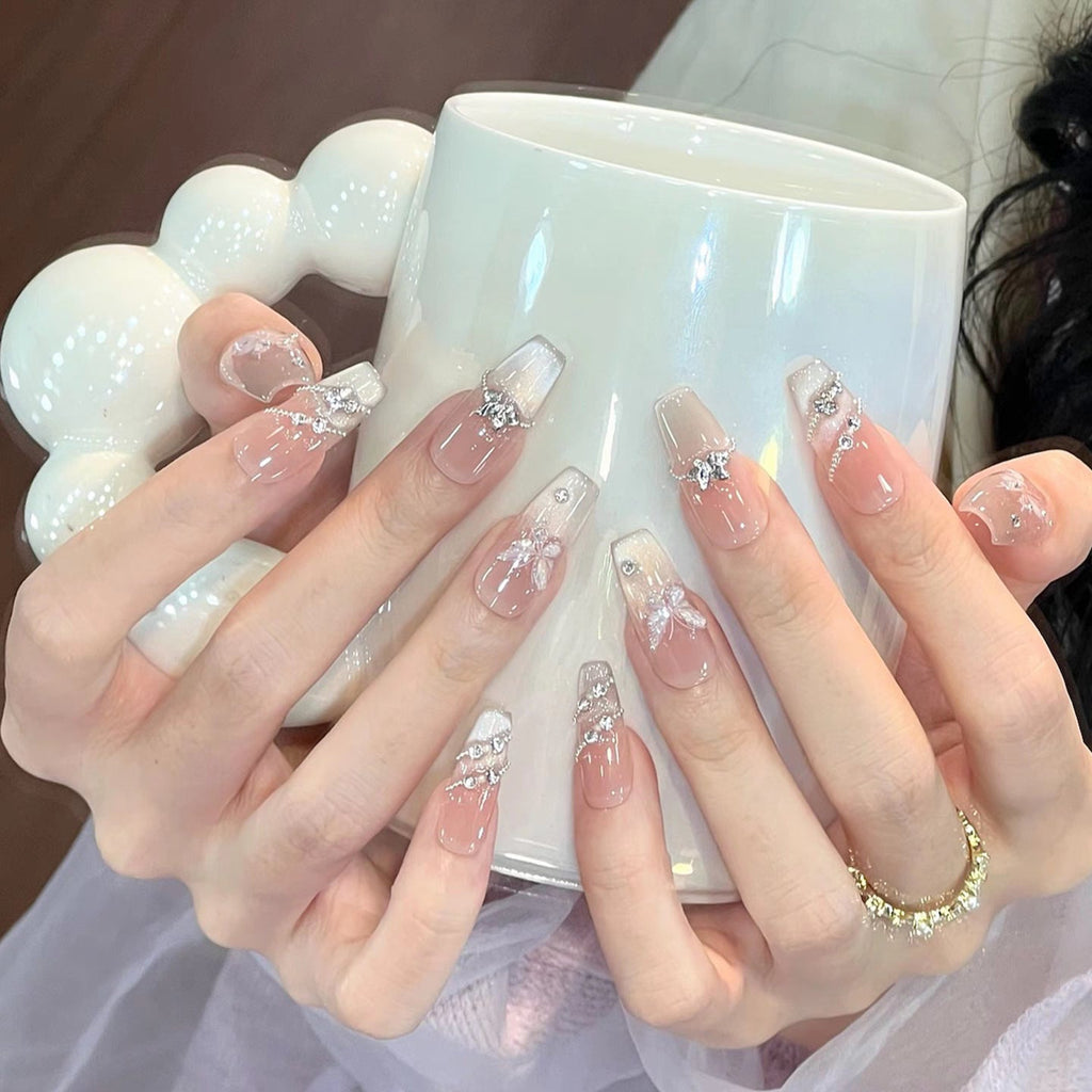 Siopsrl | Artistic Press-On Nail Art Set with Decorative Floral and Gemstone Accents Siopsrl