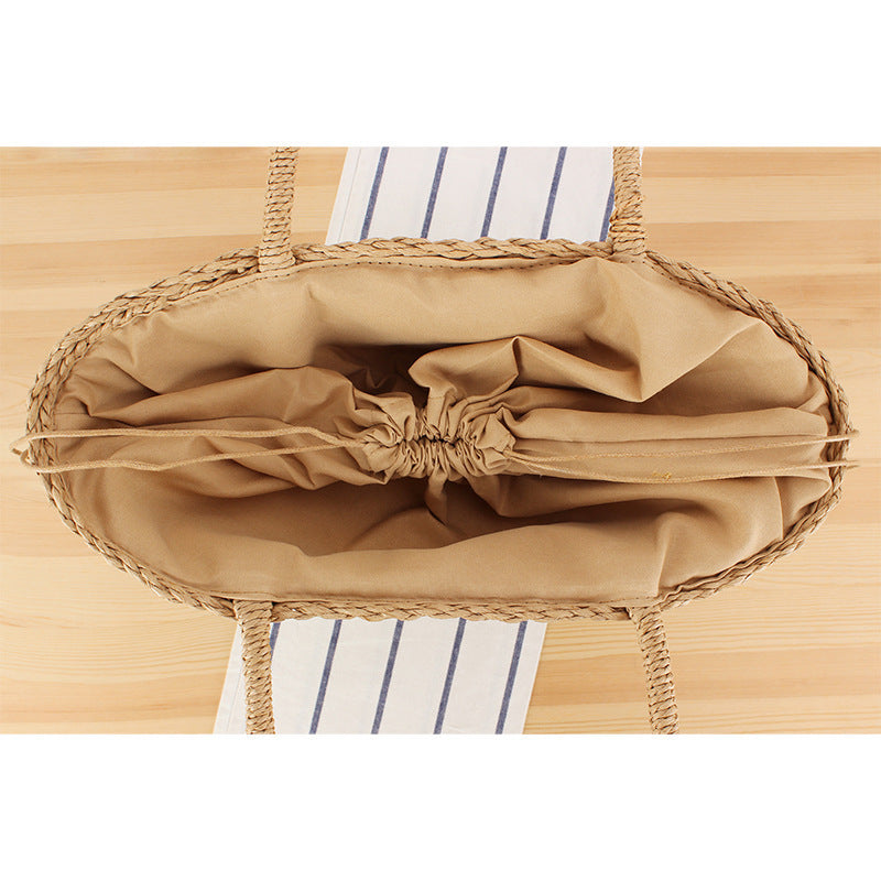 Siopsrl | Hand-knotted shopping bag made of natural weave with elegant tassel decoration Siopsrl