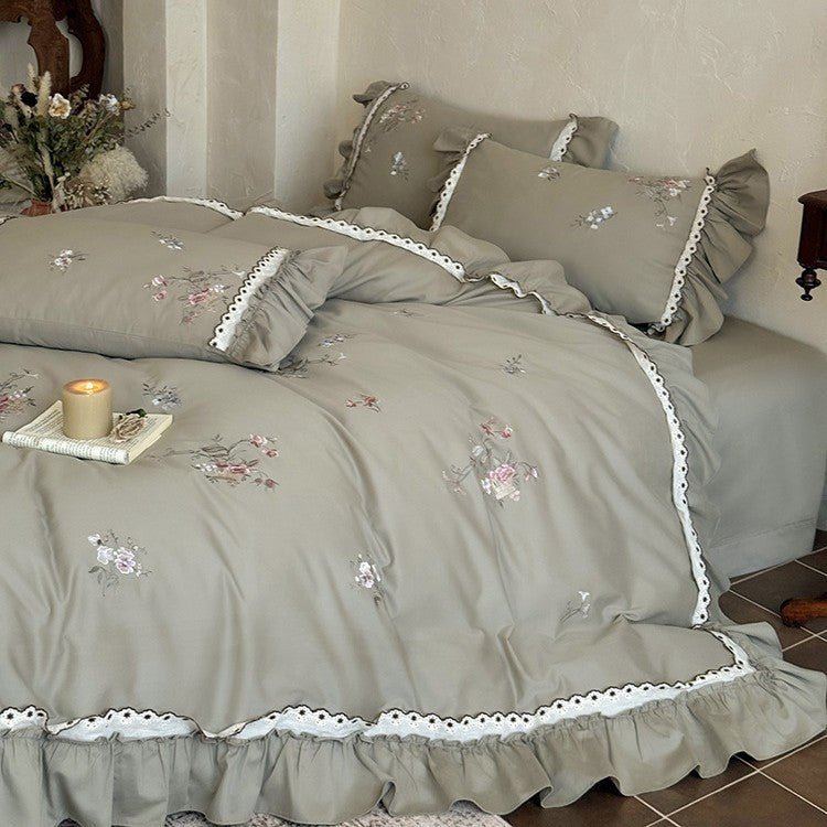 Bedding set made of cotton satin in vintage style with floral embroidery, ruffle and lace trim