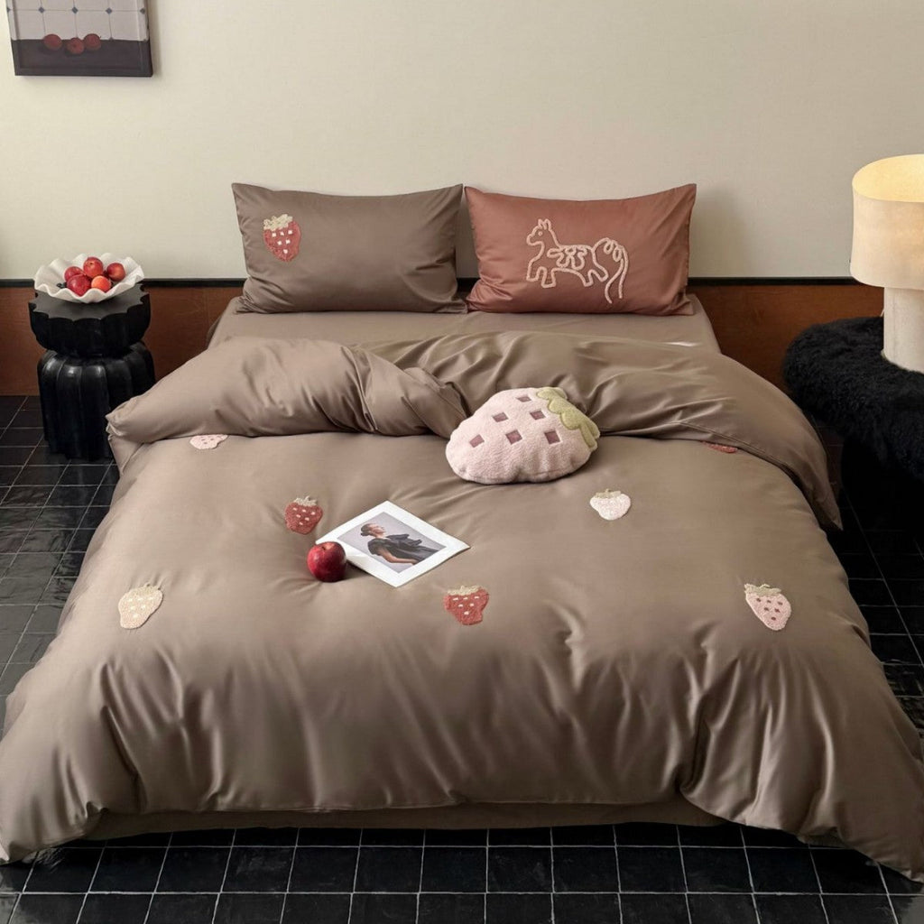 Luxurious cotton satin bedding set with embroidered strawberry appliqués