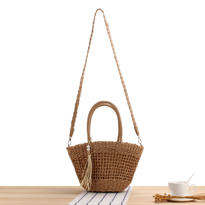 Siopsrl | Handbag made of braided natural material with elegant tassel decoration Siopsrl