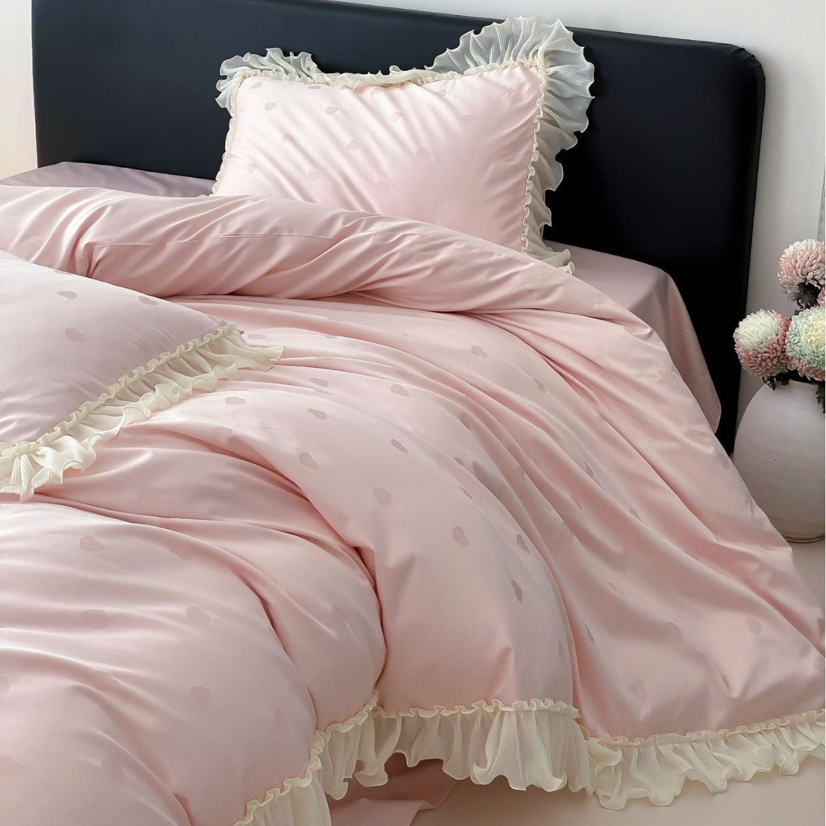 Luxurious satin bedding set with ruffles and subtle heart print Bowlift