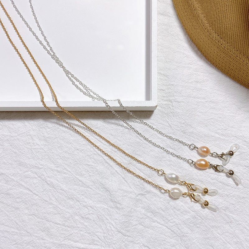 Siopsrl | Elegant jewelry holder chain with pearl and gold accents Siopsrl