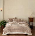 Quilted velvet bedding set with 3D waffle structure and decorative border Bowlift