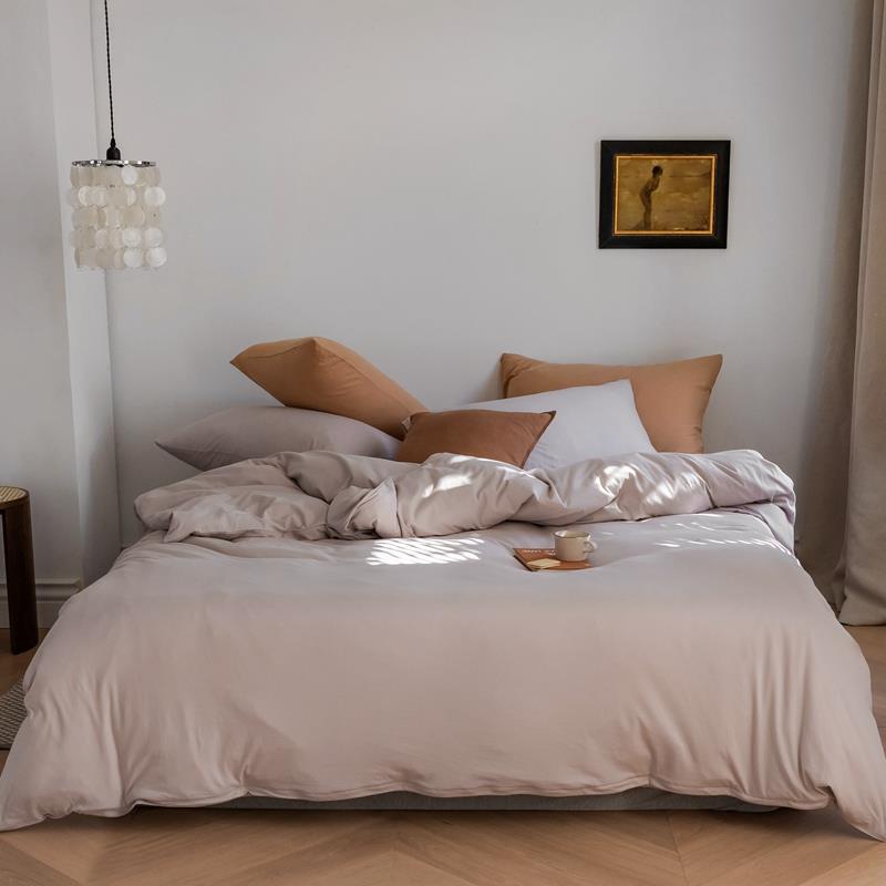 Minimalistic duvet cover set made of skin-friendly cotton blend with soft fiber filling
