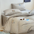Reversible cotton satin bedding set with fine stripe pattern and cute cat embroidery