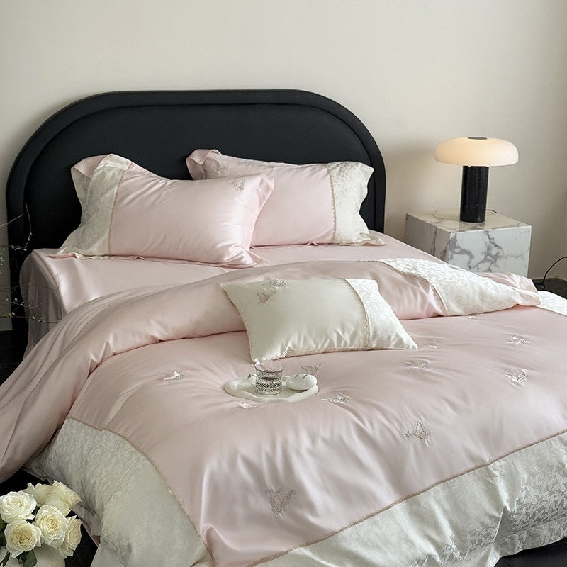 Luxurious cotton satin bedding set with butterfly embroidery and tie band pillow