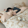 Cotton percale bedding set with natural leaf print and reversible look