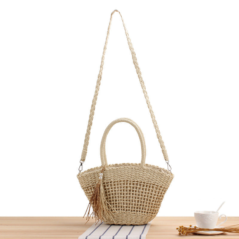 Siopsrl | Handbag made of braided natural material with elegant tassel decoration Siopsrl