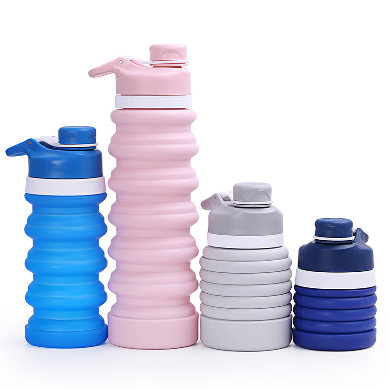 Siopsrl | Collapsible silicone water bottle with ergonomic ribbed grip and flip-top spout Siopsrl