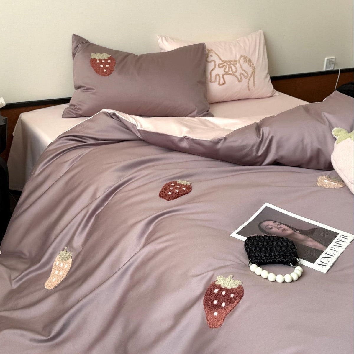 Luxurious cotton satin bedding set with embroidered strawberry appliqués