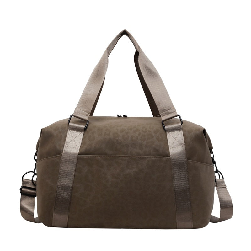 Siopsrl | Sporty duffel bag with animal pattern and practical carrying options Siopsrl