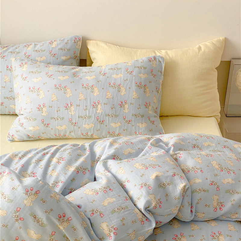 Playful bed linen set made of cotton percale with peach print and reversible function