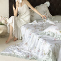 Satin sleep set with silky finish, watercolor flower motif and ruffle edges