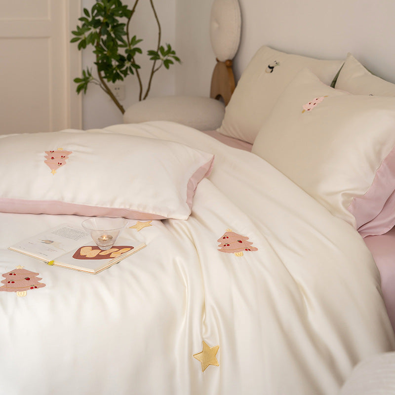 Luxurious satin bedding set with embroidered cherry motifs, reversible function and plush bunny pillow