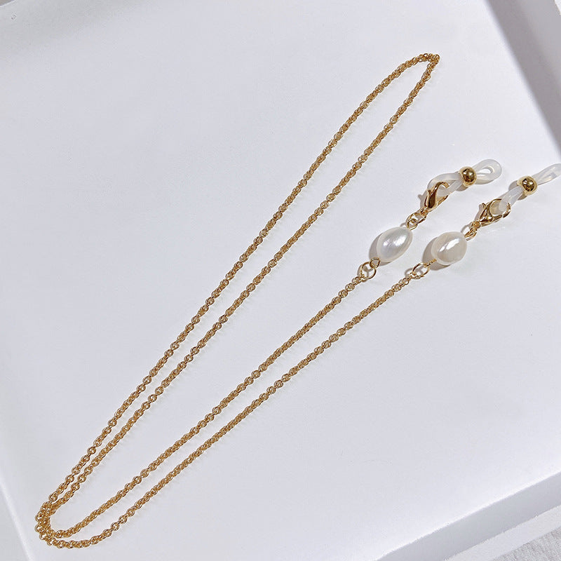 Siopsrl | Elegant jewelry holder chain with pearl and gold accents Siopsrl