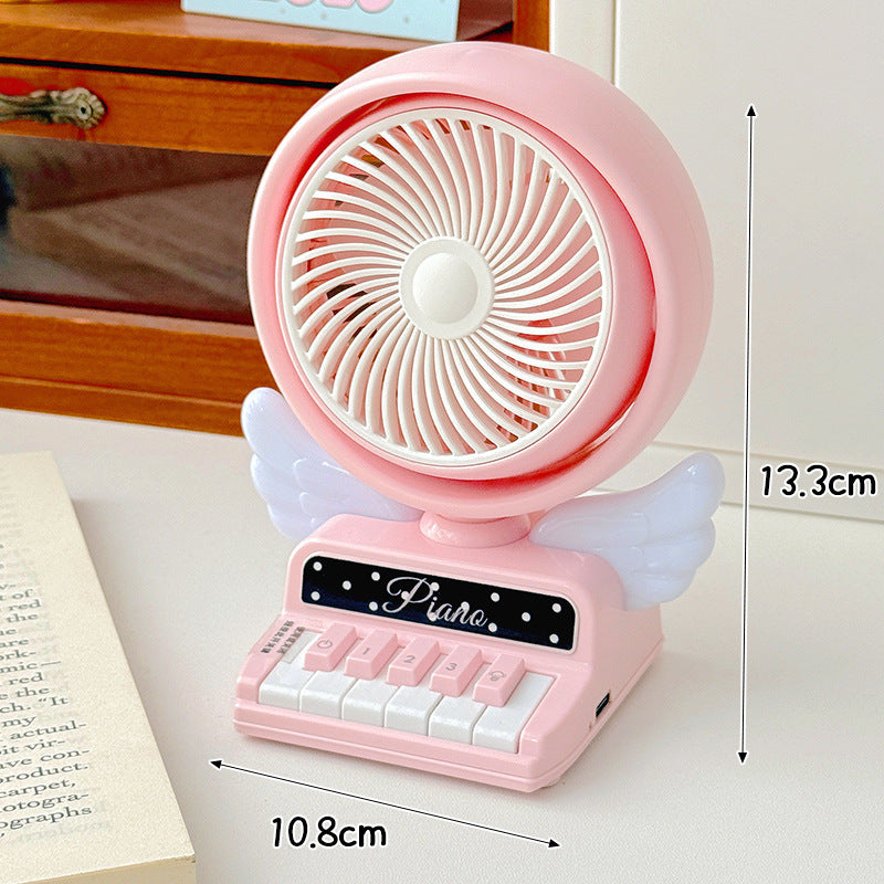 Siopsrl | Portable table fan in playful piano design Siopsrl