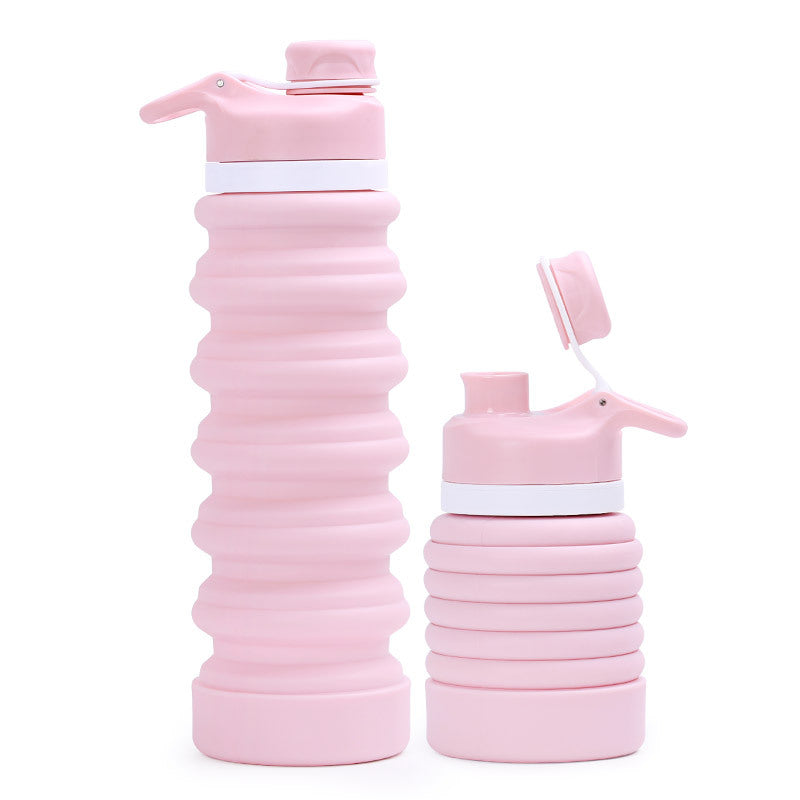 Siopsrl | Collapsible silicone water bottle with ergonomic ribbed grip and flip-top spout Siopsrl