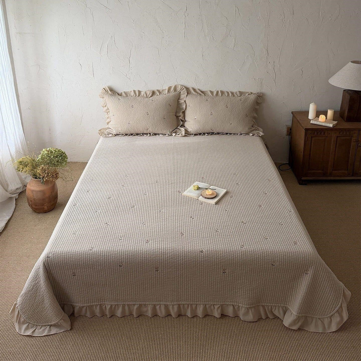 Quilted bedspread and cushion set with frill and delicate flower embroidery