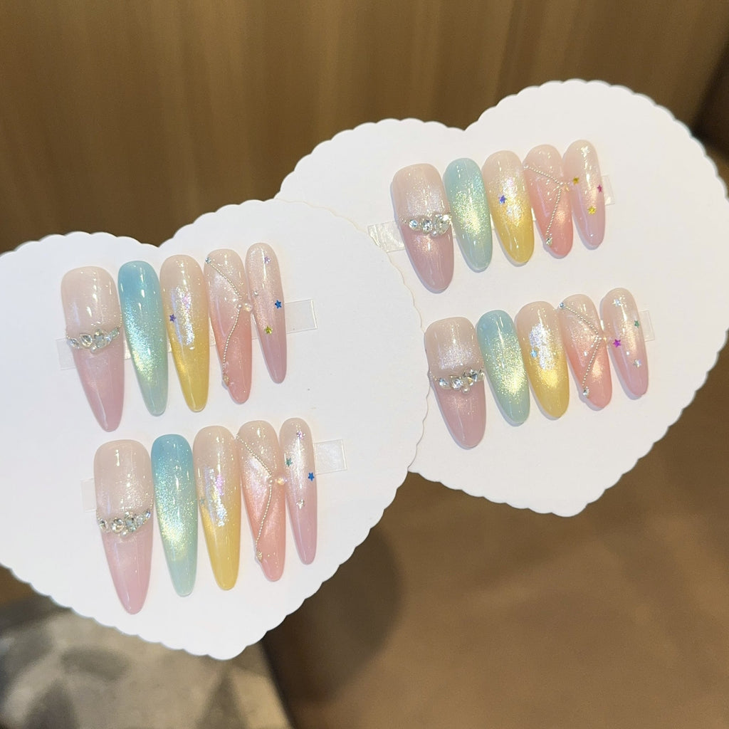 Siopsrl | Artificial nails with shimmering effects and sparkling rhinestone details Siopsrl