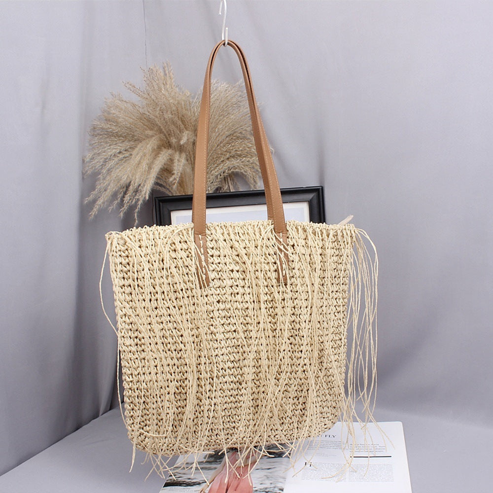 Siopsrl | Handwoven beach bag made of natural materials with leather accents Siopsrl