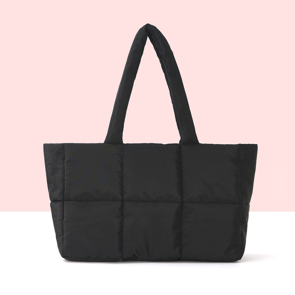 Padded carrying bag with modern quilted design Siopsrl