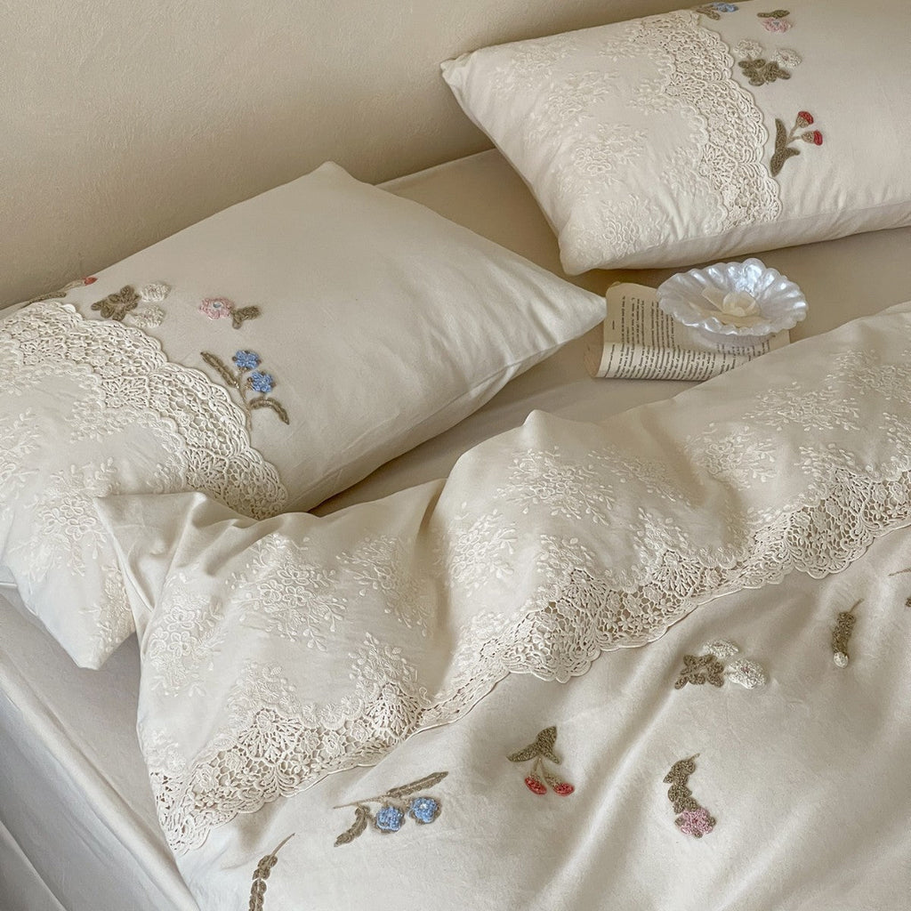 Embroidered cotton satin bedding set with lace trim