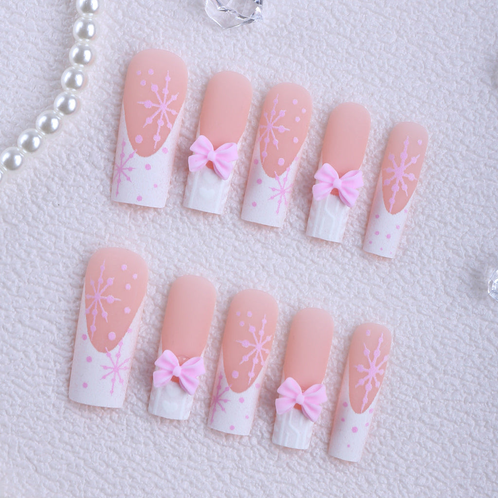 Siopsrl | Artificial nail tips with playful bows and snowflake design Siopsrl