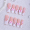 Siopsrl | Artificial nail tips with playful bows and snowflake design Siopsrl