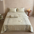 Elegant bedding set made of cotton satin with floral embroidered border and decorative roll cushion Bowlift
