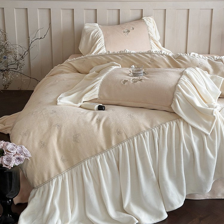 Satin bedding set with gathered ruffles and delicate butterfly embroidery