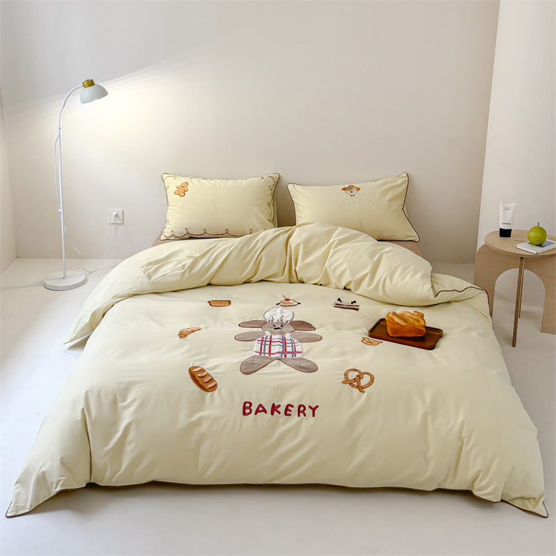 Bedding set made of cotton satin with embroidered baker motif