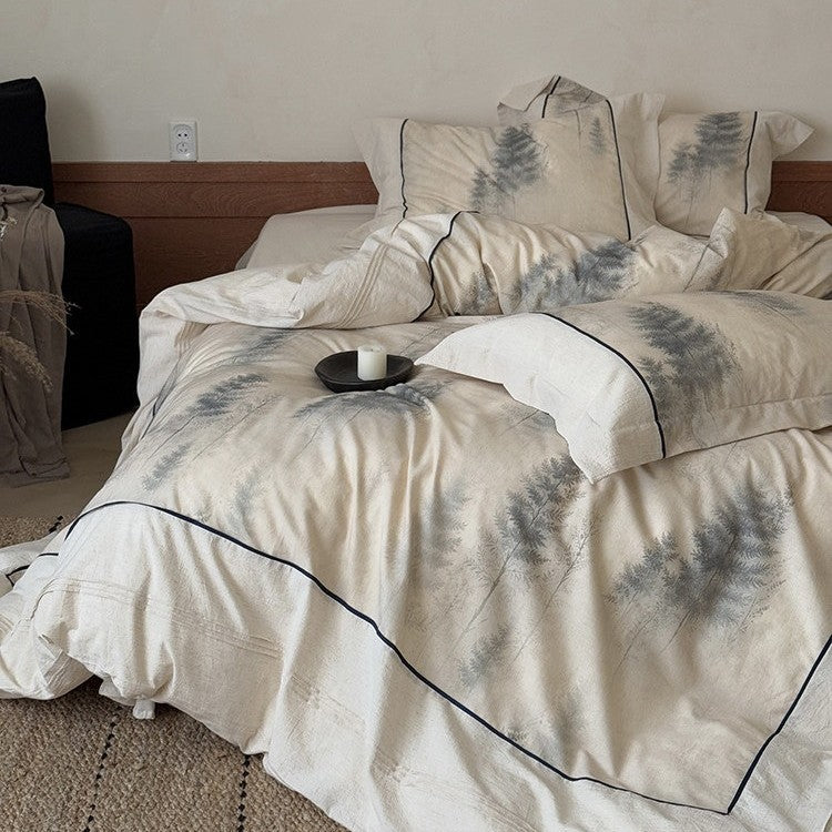 Bedding set made of cotton percale with delicate watercolor fern print and contrasting piping