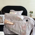Luxurious satin bedding set with floral embroidery and silk-soft finish Bowlift
