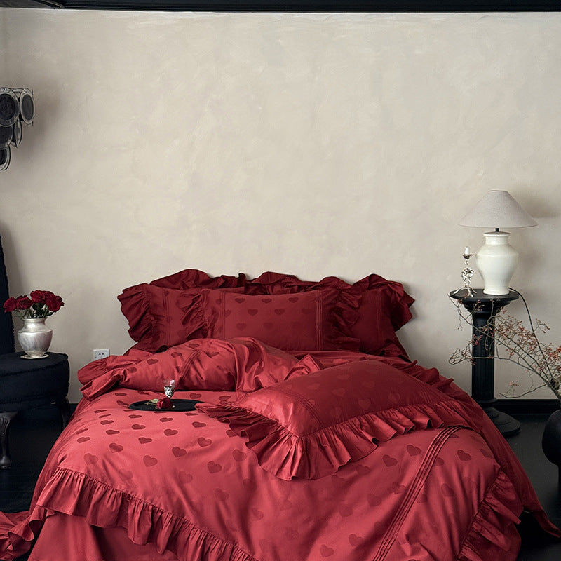 Luxurious satin bedding set with heart jacquard, ruffled frills and hotel closure Bowlift