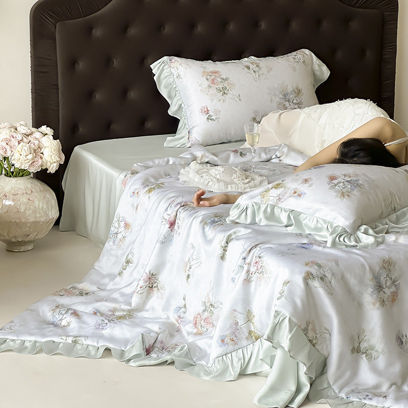 Satin sleep set with silky finish, watercolor flower motif and ruffle edges
