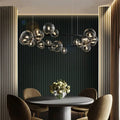 Siopsrl| Modern Creative Metal Chandelier Lighting: 7/10 Clear Glass Bubbles, Long Round Design with G9 Light Fixture
